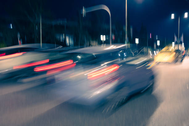 City street with blurred motion traffic at night