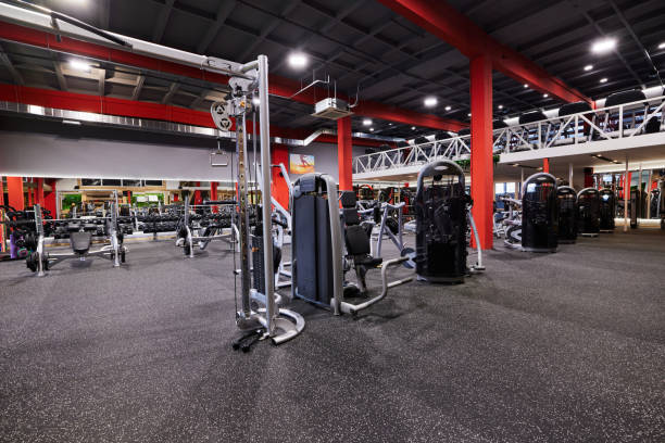 istock Gym without people with large group of exercise machines. 2148789657