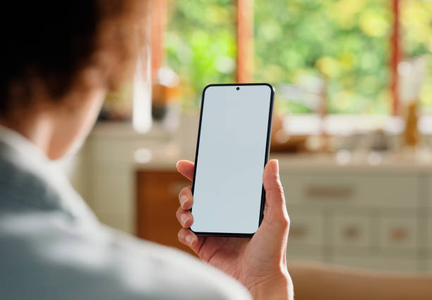 Hand, woman and blank phone screen for watching, app and streaming on tech or video for research. Closeup of person, mockup space and back by empty display, website and home for internet connection