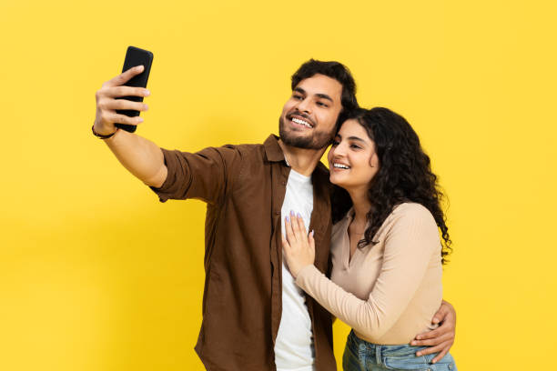 Happy Couple Taking Selfie Together With Smartphone