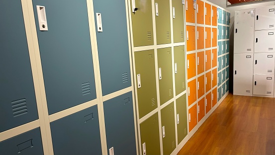 Rows of colorful lockers line the room for storage