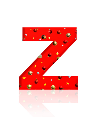 Close-up of three-dimensional Christmas ornament alphabet, red letter Z on white background.