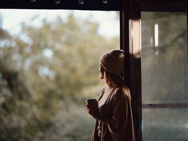istock Happy woman day dreaming while enjoying in her coffee time. 2148791254