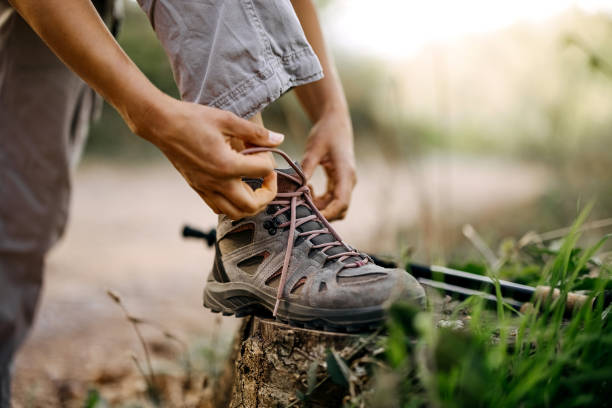 Tying shoelaces on shoes in nature!