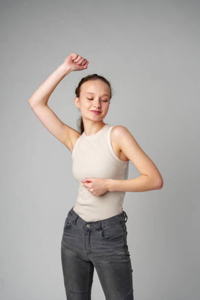 istock Woman in Tank Top Posing for Picture 2148791882