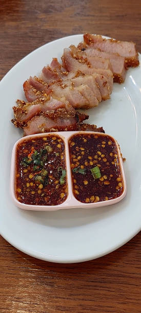 istock Spicy Grilled Pork Neck Delight, Restaurant in Bangkok. 2148792019