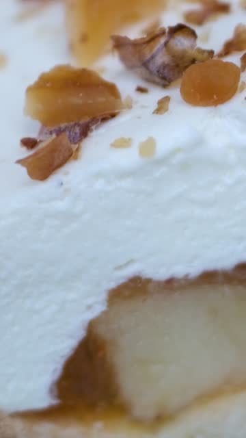 Closeup of a slice of cinnamon apple fruit pie on a plate