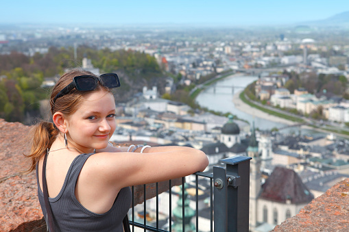 Girl watching Salzburg from above