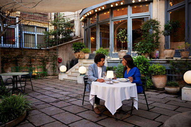 istock Mature couple enjoying evening meal 2148793197