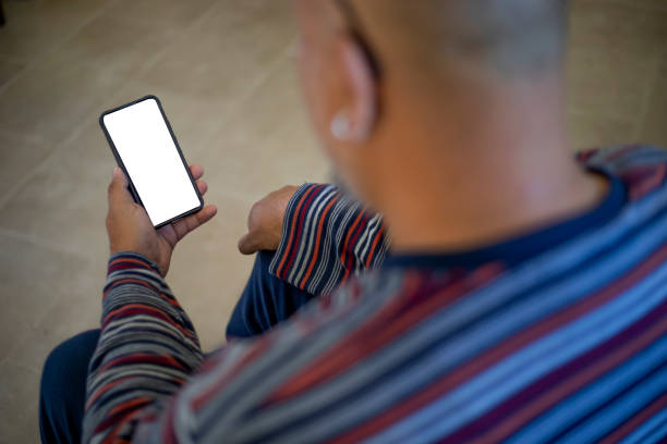 istock Man holding cell phone in her hand 2148794674