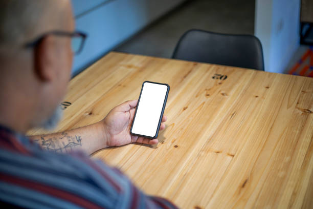 istock Man holding cell phone in her hand 2148794705
