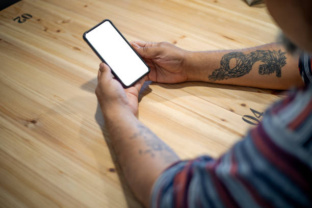 istock Man holding cell phone in her hand 2148794711