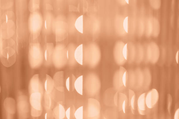 Blurred bokeh background trending peach color.