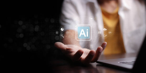istock Chat with AI or Artificial Intelligence. Young businessman chatting with a smart AI or artificial intelligence using an artificial intelligence chatbot developed by OpenAI. 2148795469