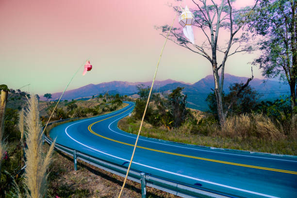 The winding and steep roads amidst the complex and beautiful mountains of Bo Kluea District in Nan Province, Thailand.