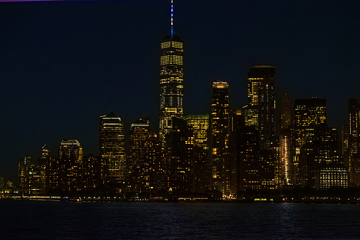 View of New York City from Staten Island Ferry late in the evening