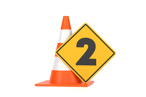 Traffic Cone And Traffic Sign With Number 2 On White Background