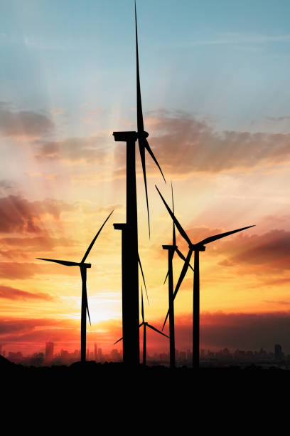 istock Wind turbine generating electricity on sky sunset background 2148797831