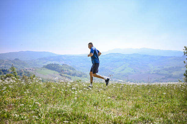 istock Mid adult man exercising in nature. 2148798477