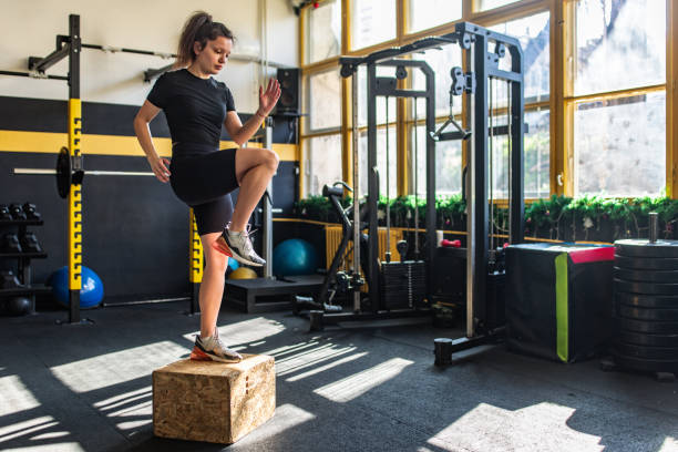 istock Woman exercising in gym 2148799203