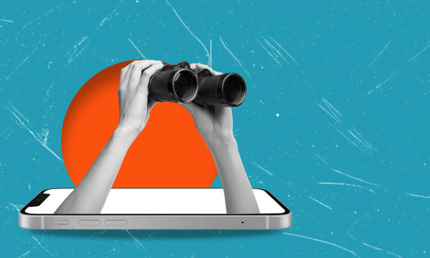 istock Planning and analytics, art collage. Hand with binoculars from a cell phone. 2148800282