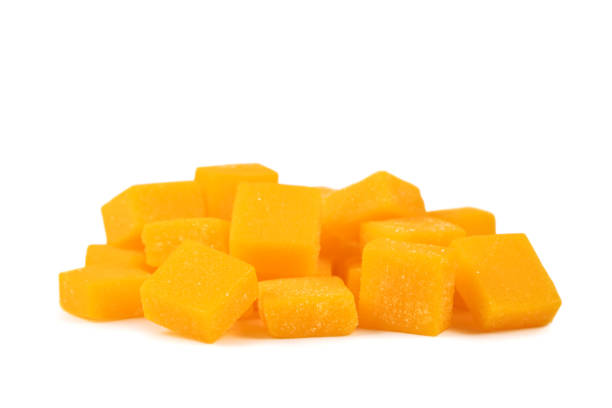 istock view of candied mango dices isolated on white 2148803480