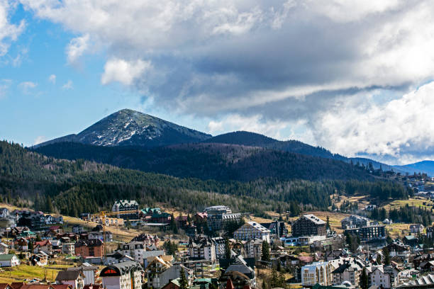 istock construction building in the mountains at a ski resort. construction and mortgage 2148804003