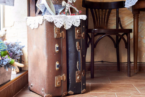 istock Two old suitcases in the interior of the cafe 2148804608
