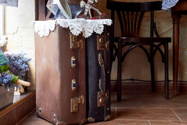 istock Two old suitcases in the interior of the cafe 2148804833