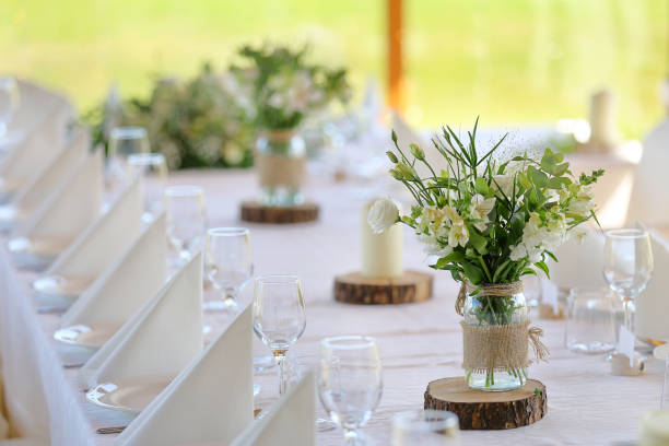 istock White flowers decorated on the table for event party or wedding reception 2148805121
