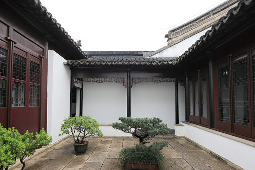 Architecture and scenery around gyeonghuigung palace with the entrance and the pathway to the main courtyard.