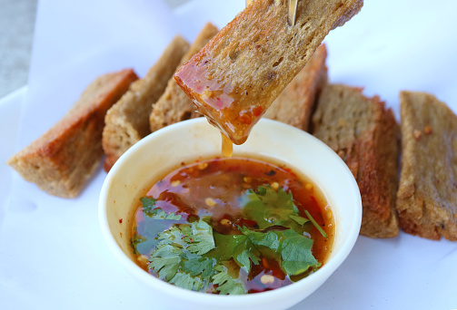 Delectable Crispy Fish Crackers or Kropek Dipping Sweeten Chili Sauce