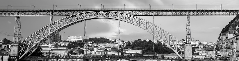 Frontal view from the river of the steel bridge Don Luis I. Douro river in Porto. Portugal.