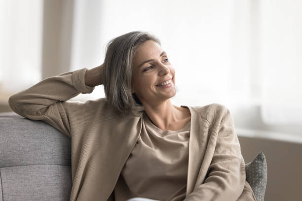 istock Smiling mature woman enjoy weekend relaxation at home 2148806617
