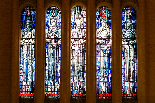 Canberra, Australia - October 22, 2009 : Australian War Memorial. Stained glass window depicting qualities of Australian servicemen : comradeship, ancestry, patriotism, chivalry, and loyalty.