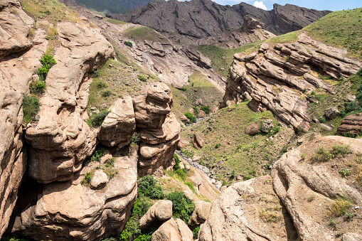Alamut Canyon view in Iran. Cave structured canyons are located in Alamut Valley area at the southern slope of Alborz Mountain range at northern Iran.