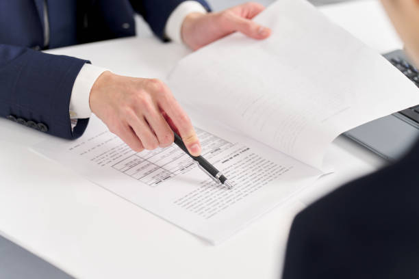istock Business person pointing out mistakes at work 2148808978