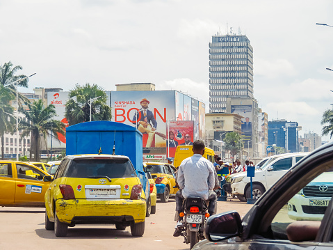 Kinshasa, Democratic Republic of Congo - March 23, 2023 : Busy road through Kinshasa in The Democratic Republic of Congo.