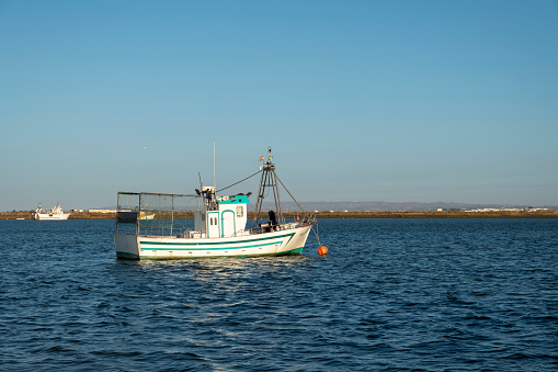 Foz, Spain- May 28, 2020: Two fishing boats mooring, Foz, A Mariña touristic area, Lugo province,  fishing harbor, Galicia, Spain.