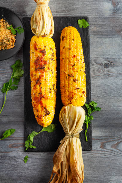 istock Grilled Corn Cob with Herbs and Cheese. Corn On The Cob. Corn. Sweet yellow corn. Fresh corn with spice. Barbecue and grilled corn with cheese. 2148814865