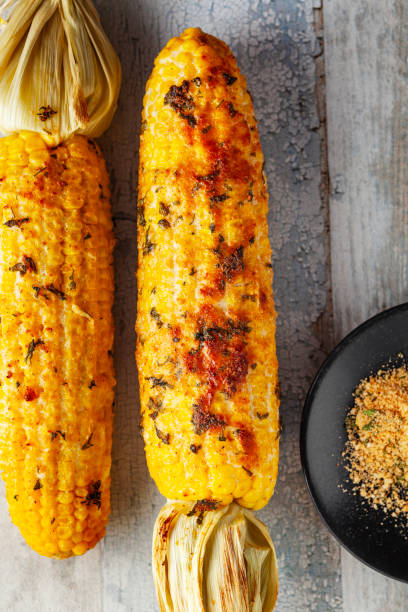 istock Grilled Corn Cob with Herbs and Cheese. Corn On The Cob. Corn. Sweet yellow corn. Fresh corn with spice. Barbecue and grilled corn with cheese. 2148815010
