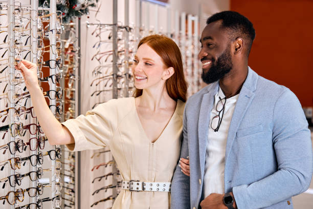 istock cheerful couple enjoying spending time at optics 2148816035