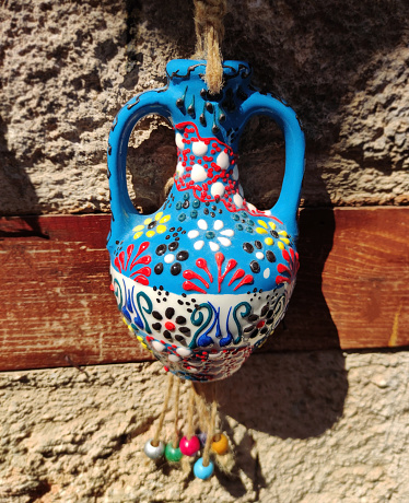 Oriental Turkish hanging home decor in the shape of  blue jug with floral ornament