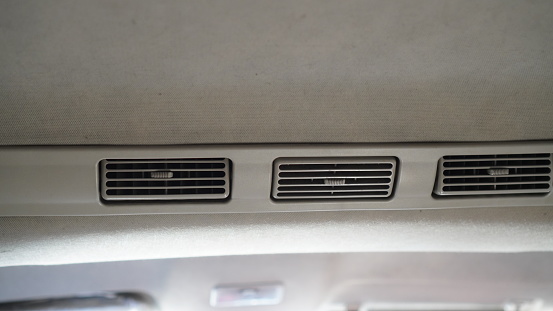 Close-up of the back of the car's front seatback, which has a pocket for storing small items.