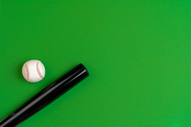 Baseball equipment isolated on white background. Close-up sports equipment. Baseball bat and ball.
