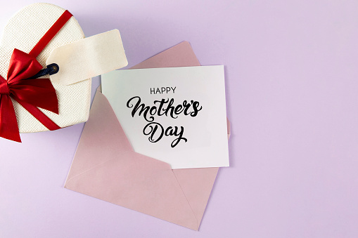 Mother’s Day greeting card with heart shape gift box
