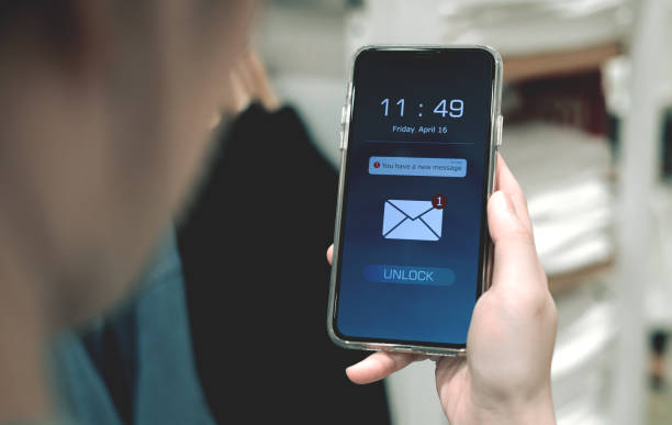 istock Electronic mail. Notification of new message inbox on mobile phone 2148820341
