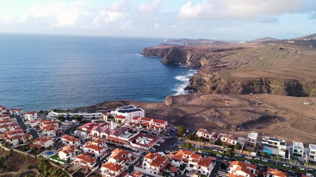 Aerial view of the town of Agaete and its Puerto de las Nieves at summer sunset