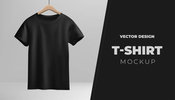 istock A black tshirt mockup hangs on a wooden hanger against a white backdrop. For showcasing fashion designs for both men and women, providing a realistic presentation. Not AI. 2148823587