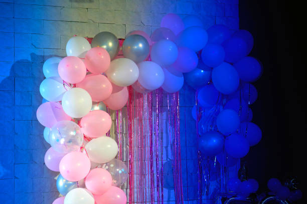 istock Festive blue shadow background with light pink balls.Space for text 2148825417